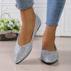 Women's glitter pointed toe flats by Arenzza, showcasing shiny glitter fabric and sleek pointed toe design.