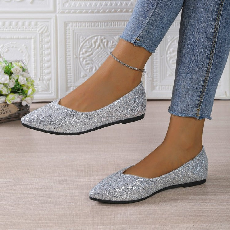 Women's glitter pointed toe flats by Arenzza, stylish and shiny slip-on shoes with a sleek pointed toe design.