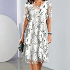 Aarenza women's floral print chiffon dress with elegant design, featuring a flowing fabric and vibrant floral pattern.