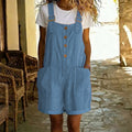 Aarenza retro solid color romper with adjustable straps, featuring a sleeveless design and relaxed fit, displayed on a hanger.