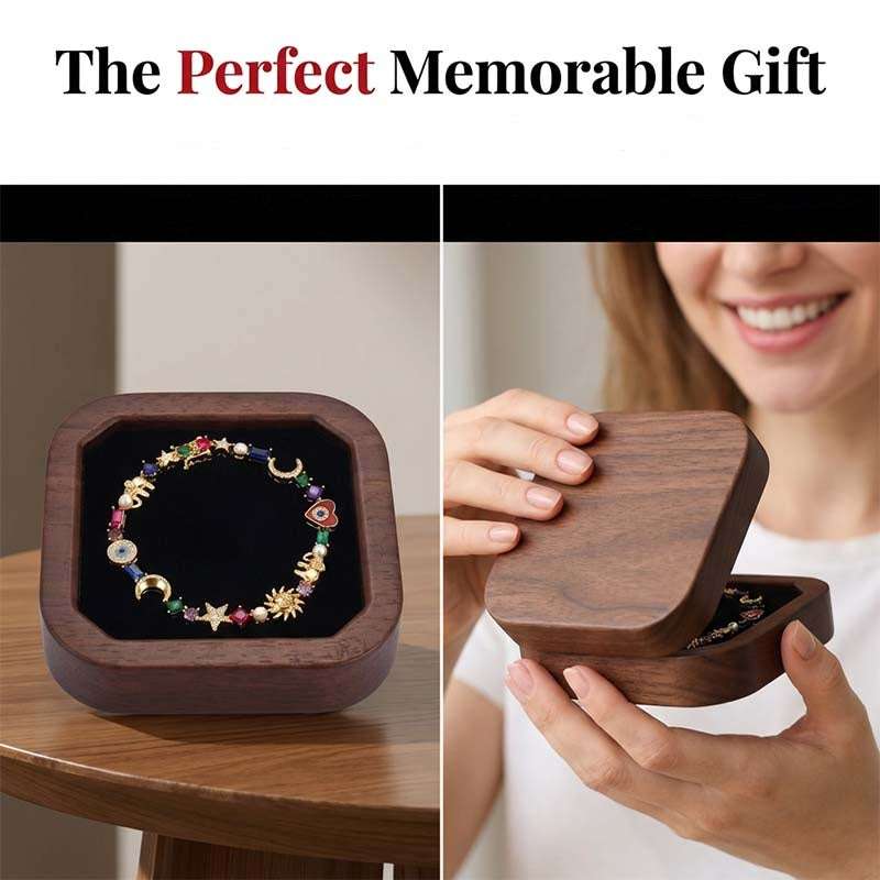 Arenzza whimsical celestial charm bracelet with star and moon designs, shown with a free storage box. Perfect for accessories.