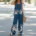 A woman wearing a sleeveless top and wide-leg pants set by Arenzza, featuring a stylish, casual outfit with neutral tones.