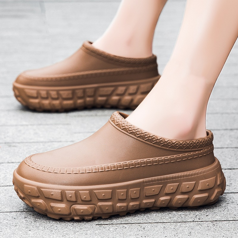 A pair of stylish Arenzza non-slip closed toe clogs with a sleek design, suitable for comfortable everyday wear.