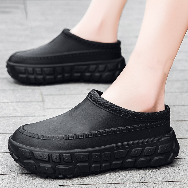 A pair of stylish Arenzza non-slip closed toe clogs with a sleek design, perfect for comfortable, everyday wear.