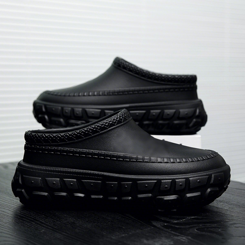 A pair of stylish Arenzza non-slip closed toe clogs with a sleek design, perfect for comfortable, practical footwear.