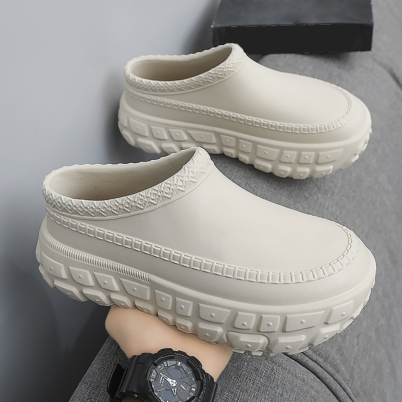 A pair of stylish Arenzza non-slip closed toe clogs with a sleek design, perfect for comfortable, everyday wear.