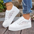 A pair of Arenzza women's breathable mesh platform sneakers with white soles and stylish design, perfect for casual wear.