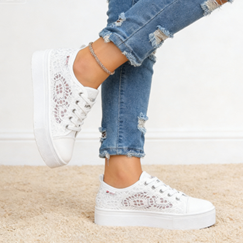 A pair of women's breathable mesh platform sneakers by Arenzza featuring stylish design and comfortable sole.