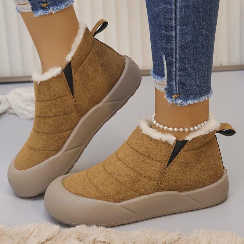 A pair of Arenzza waterproof soft-sole cotton winter boots with plush lining and sturdy soles for cold weather comfort.