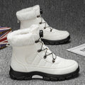 A pair of men's cozy Arenzza boots with soft faux fur lining and durable outer material, perfect for cold weather.