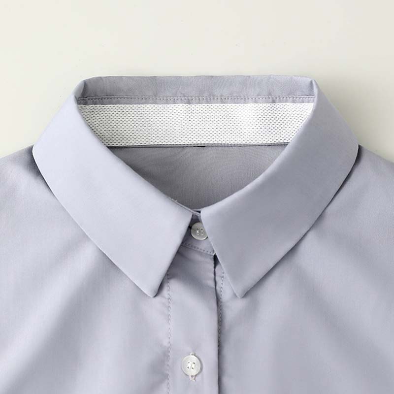 A white disposable collar and cuff sweat liners from Arenzza, designed to protect clothing from sweat and stains.