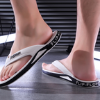 A pair of Arenzza men's sporty flip flops with ultra-soft soles, perfect for beach, gym, and daily wear.