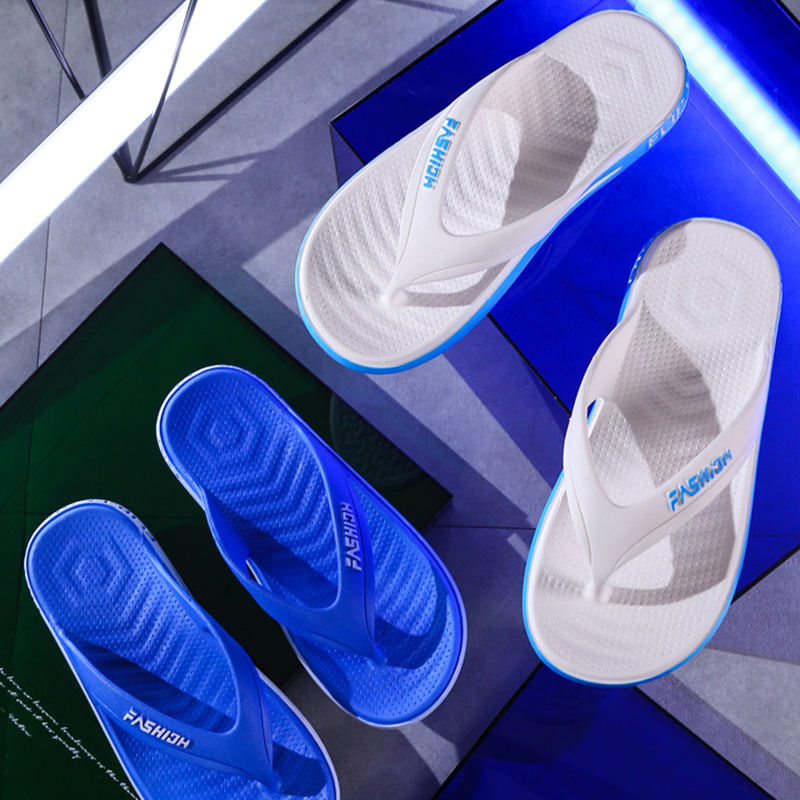 A pair of Arenzza men's sporty flip flops with ultra-soft soles, ideal for beach, gym, and daily wear, shown from top view.