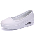 A pair of women's breathable nursing shoes from Arenzza, featuring comfortable design and casual style for everyday wear.