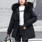 A woman wearing a thickened, loose hooded fleece parka coat by Arenzza, perfect for winter warmth and casual outdoor wear.