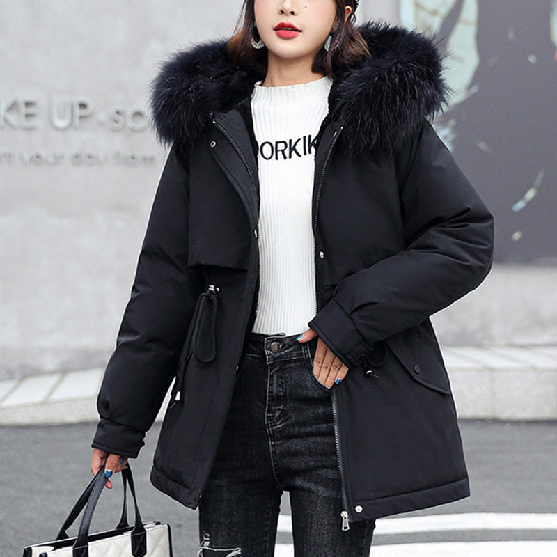 A woman wearing a thickened, loose hooded fleece parka coat by Arenzza, perfect for winter warmth and casual outdoor wear.