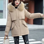 A woman wearing a thick, hooded synthetic fleece winter parka coat by Arenzza, showcasing the cozy, loose fit design.