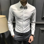 Men's wrinkle-free button-down shirt by Arenzza, shown in a crisp, neatly pressed style with a classic collar and front buttons.