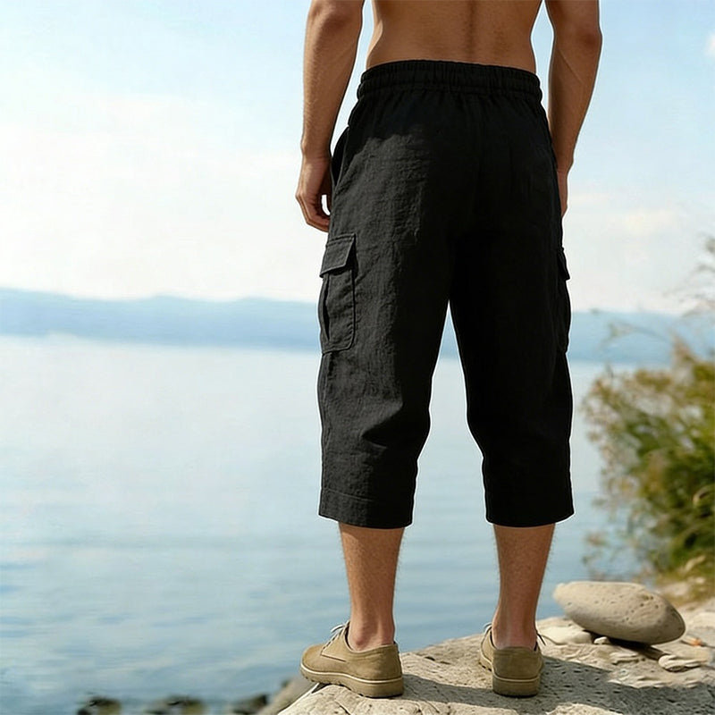 A men's linen blend cargo capri pants by Arenzza, featuring a relaxed fit, multiple pockets, and a casual summer style.