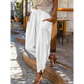 Women's casual linen blend harem pants by Arenzza, shown with relaxed fit and elastic waistband, in natural fabric and neutral color.