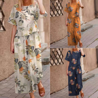 A woman wearing a loose print top and matching pants 2-piece set by Arenzza, showcasing casual, comfortable clothing.