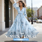 Elegant V-neck floral pleated maxi dress by Arenzza featuring a flowing silhouette and vibrant floral pattern.