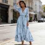 Aarenza elegant floral V-neck maxi dress with pleats, featuring a flowy silhouette and vibrant flower pattern, perfect for summer.