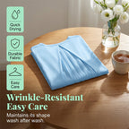 Aarenza flowy short sleeve top with inverted pleat back, lightweight fabric, and relaxed fit, in a soft, neutral color.