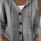 Aarenza women's solid color long sleeve cardigan in a cozy knit fabric, displayed on a hanger in a neutral tone.
