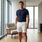 A pair of men's casual linen shorts with pockets, featuring a relaxed fit and neutral color, from Arenzza.