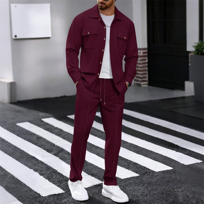 A man wearing the Arenzza men's waffle button-down jacket and matching pants set, casual clothing with a textured waffle pattern.