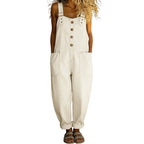 A woman wearing Arenzza women's casual baggy denim overalls with front and back pockets, standing outdoors.