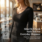 A woman wearing a black slim fit basic V-neck tee from Arenzza, showcasing the fitted style and soft fabric.