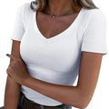 A woman wearing a black slim fit basic V-neck tee from Arenzza, showing the fitted style and short sleeves.