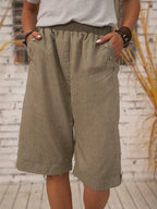 A pair of women's summer casual pocket shorts from Arenzza, featuring a comfortable fit and stylish design for warm weather.