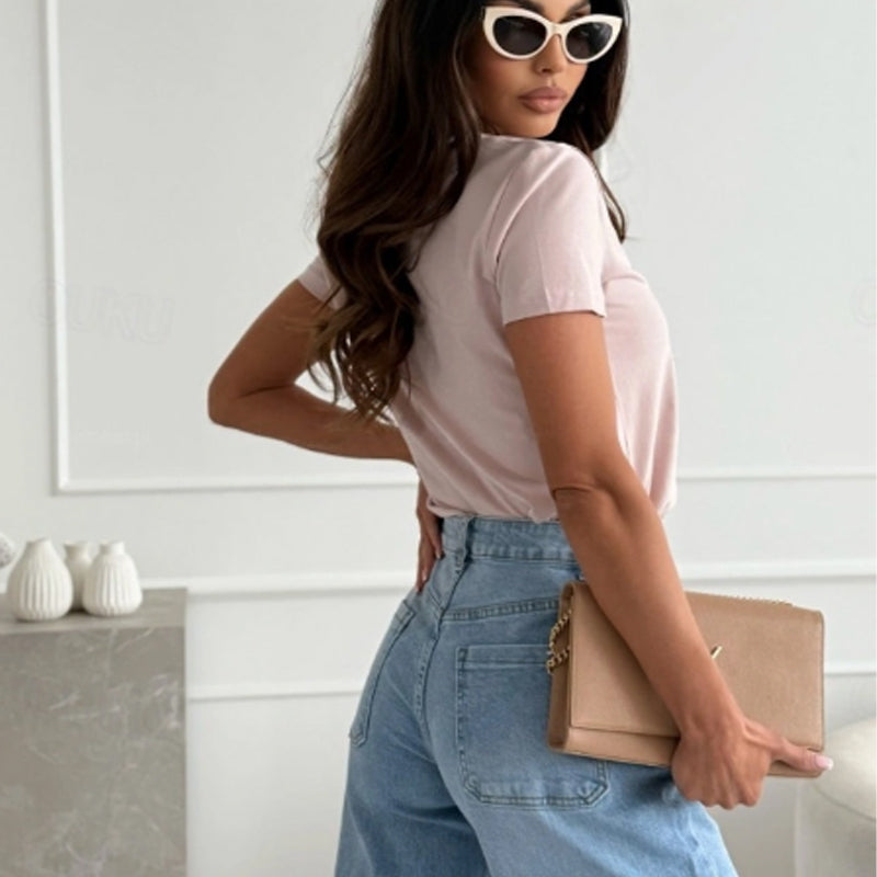A women's solid V-neck short sleeve top by Arenzza, featuring a classic fit and lightweight fabric, displayed on a hanger.