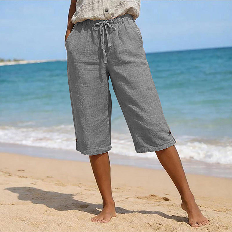 Women's casual cropped pants by Arenzza featuring button detail, relaxed fit, and stylish design for everyday wear.