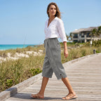 Women's casual cropped pants by Arenzza featuring button detail and a relaxed fit, perfect for everyday wear.