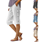 A pair of women’s loose cotton linen breathable Capri pants by Arenzza, shown laid flat, highlighting their relaxed fit and natural fabric.