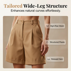 A pair of women's high-waist pleated shorts in a neutral color, featuring a relaxed fit and stylish design from Arenzza.