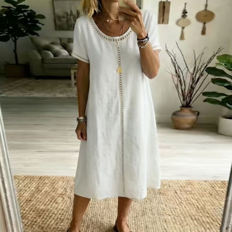 Aarenza women's loose fit short sleeve dress in soft fabric, styled casually with a relaxed fit and simple round neckline.