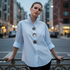 A woman wearing an oversized Arenzza women's button-down shirt with statement buttons, showing the relaxed fit and stylish design.