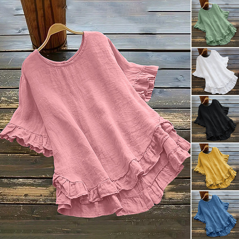 Aarenza women's round neck ruffle blouse featuring soft fabric, short ruffled sleeves, and a feminine style in a light color.