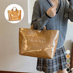 Arenzza women's retro tote bag with letter print design, featuring sturdy handles and spacious interior for everyday accessories.