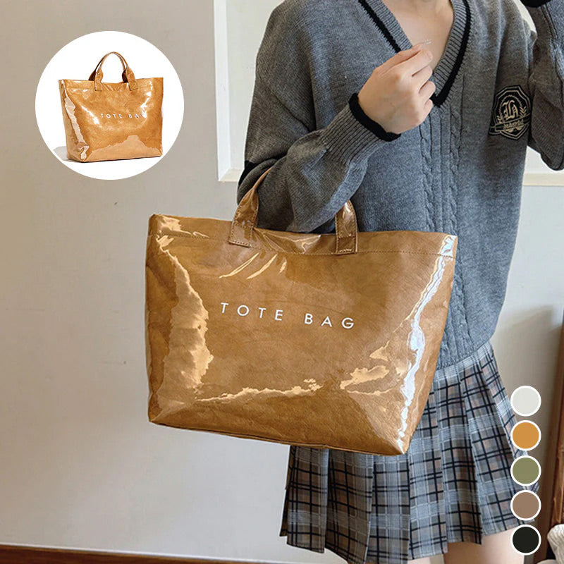Arenzza women's retro tote bag with letter print design, featuring sturdy handles and spacious interior for everyday accessories.