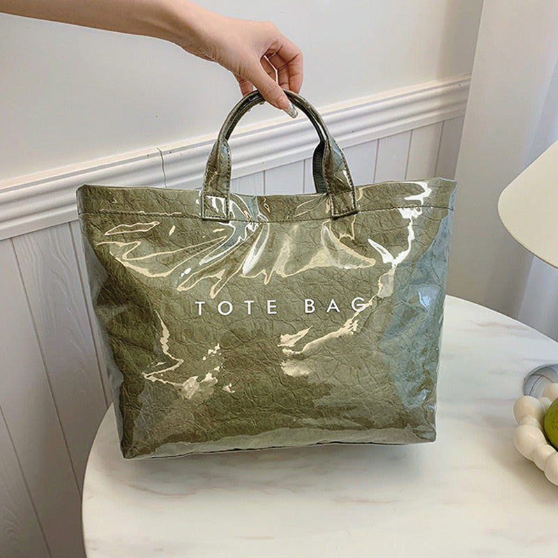 Women's retro tote bag with letter print from Arenzza, showing the spacious design and colorful vintage-inspired letters.
