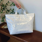 Women's retro letters print tote bag by Arenzza with colorful alphabet design on sturdy fabric in a casual style.