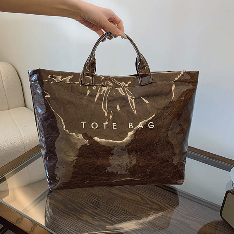 Women's retro letters print tote bag by Arenzza, featuring a stylish design with bold letter patterns on durable fabric.