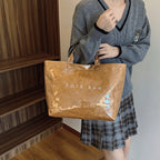 Women's retro letters print tote bag from Arenzza, featuring a stylish vintage design with bold letter graphics.