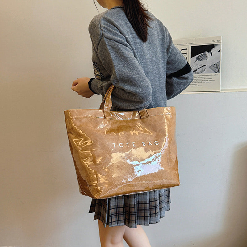 A women's retro letters print tote bag by Arenzza featuring a colorful, vintage-inspired letter design on sturdy fabric.